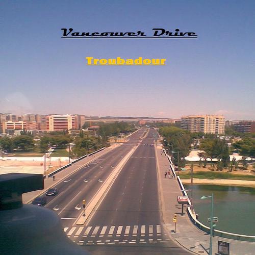 Cover art for Troubadour: A road bridge leads over a river into a city, on a clear day.