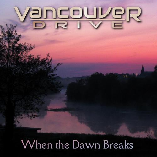 Cover art for When the Dawn Breaks: A still river surface beneath a light mist reflects a purple-red pre-dawn sky. A jetty is visible beneath a silhouetted tree on the near river bank, with lights and the outline of a town behind the trees on the opposite bank.